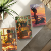 hree "Create Your Joy" journals displayed on a glass table next to a plant. The journals feature distinct cover designs, each representing different joyful activities.